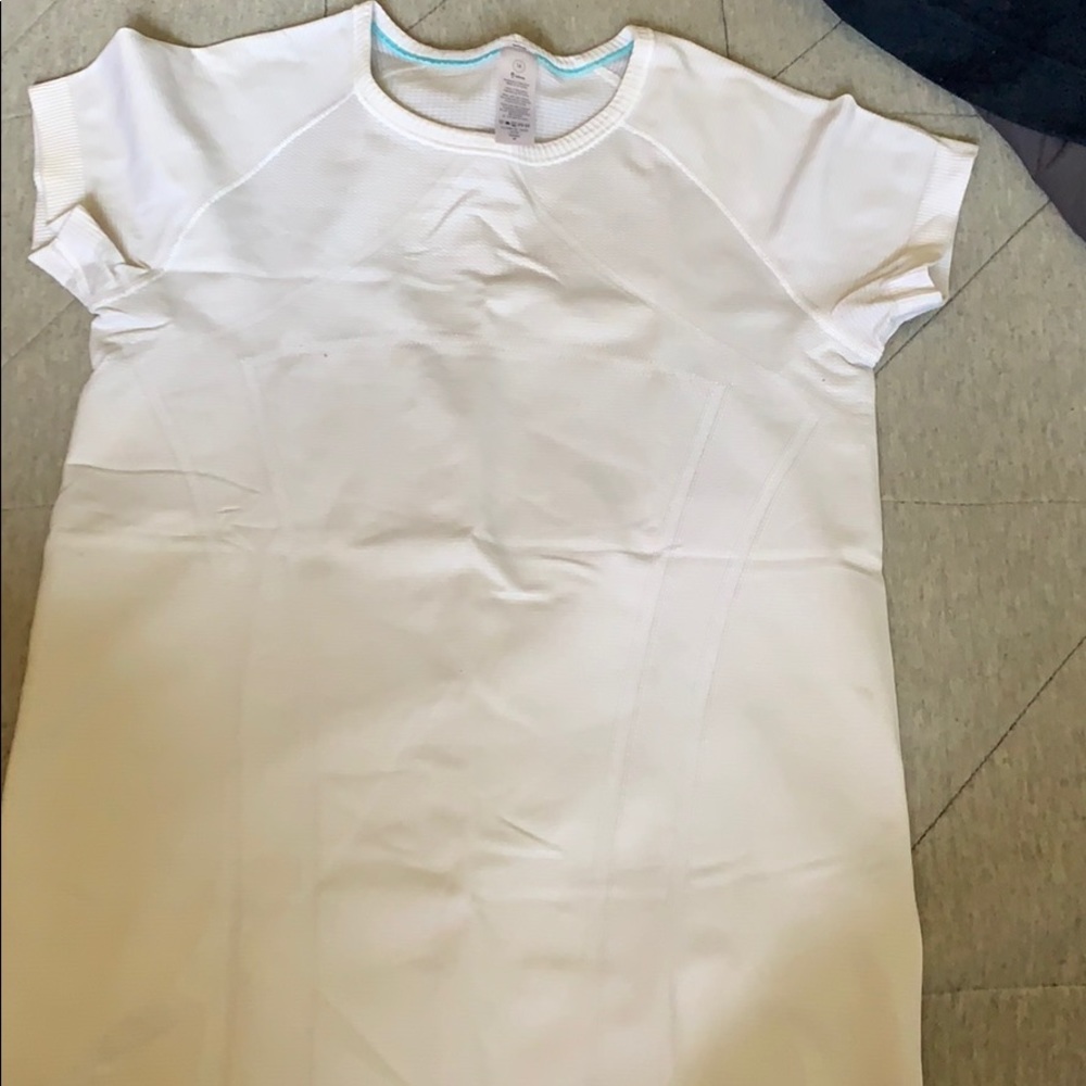 White kids lululemon/ ivviva athletic shirt